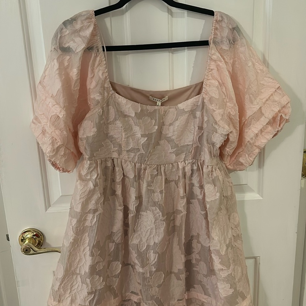 Brand new babydoll dress. Gorgeous. Size Large.